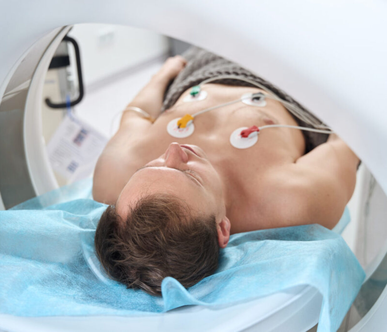 Patient is getting contrast-enhanced ECG-gated coronary computed tomography